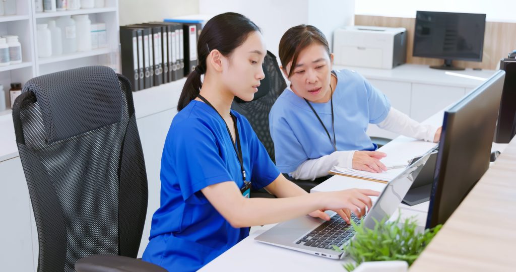 Clinic staff using management system with e-Invoicing Malaysia